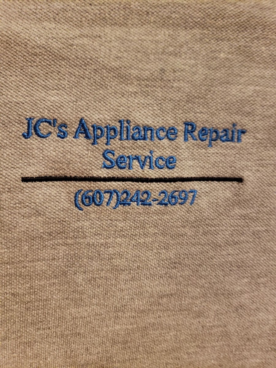 Open appliance showing internal components during a professional diagnostic repair visit.